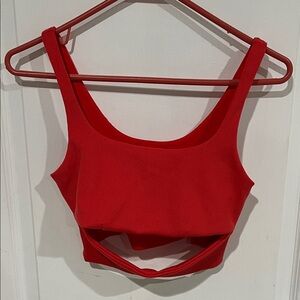 Alo yoga slit bra in color red hot summer